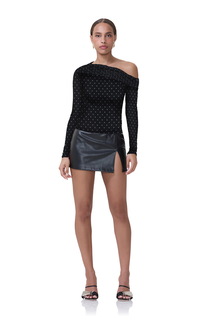 women's off the shoulder long sleeve top with asymmetrical neckline in noir dot print