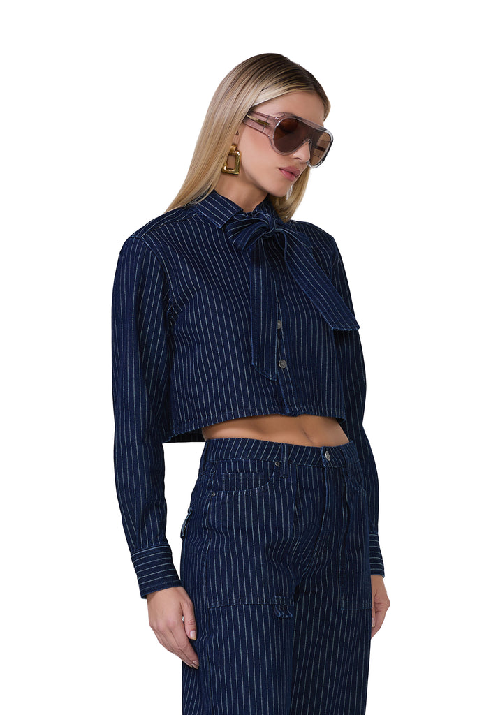 women's long sleeve cropped pin stripe shirt with an adjustable self tie neck tie in dark wash 