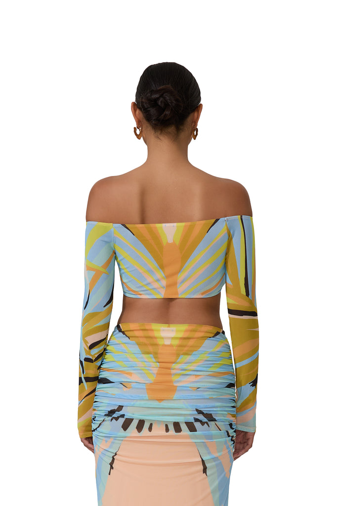 women's crop top with a plunging neck with a front ruched detail and a rose in bird of paradise print